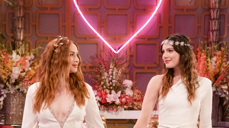 Mariah and Tessa smiling at their wedding