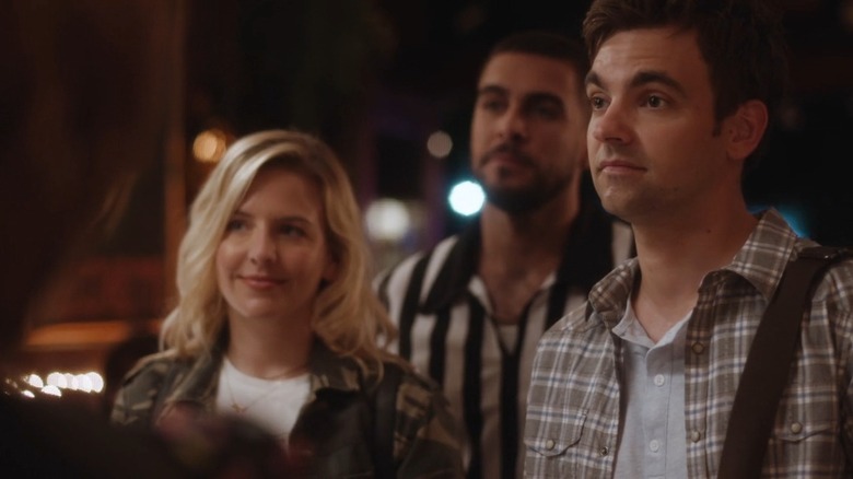 Drew Tarver as Cary Dubek in The Other Two, standing with Helene York and Josh Segarra