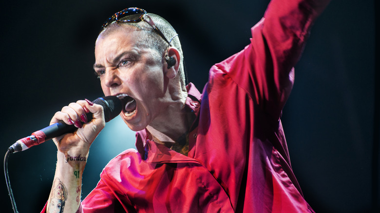 Sinead O'Connor performing at a festival