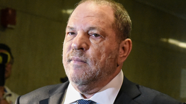 Harvey Weinstein walking