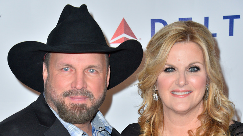 Trisha Yearwood and Garth Brooks at an event