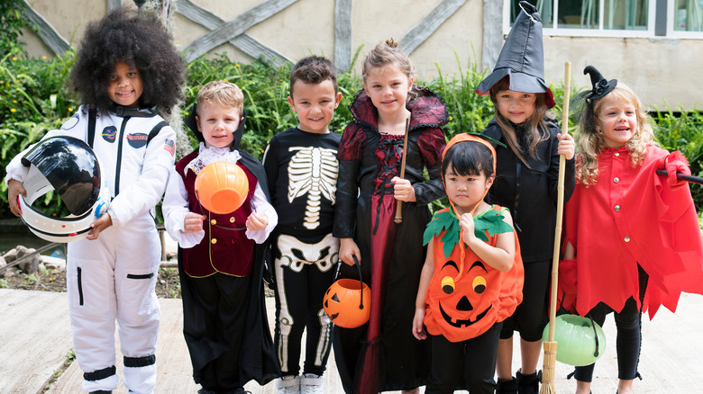 Group of kids in Halloween costumes