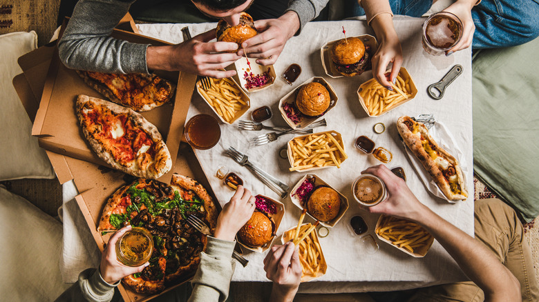 Friends enjoying food and drinks