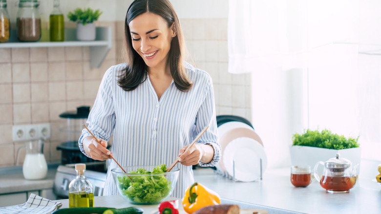 Vegan woman cooking