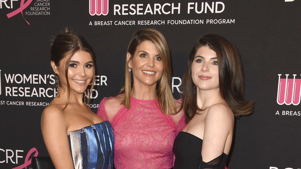 Lori Loughlin posing with her daughters