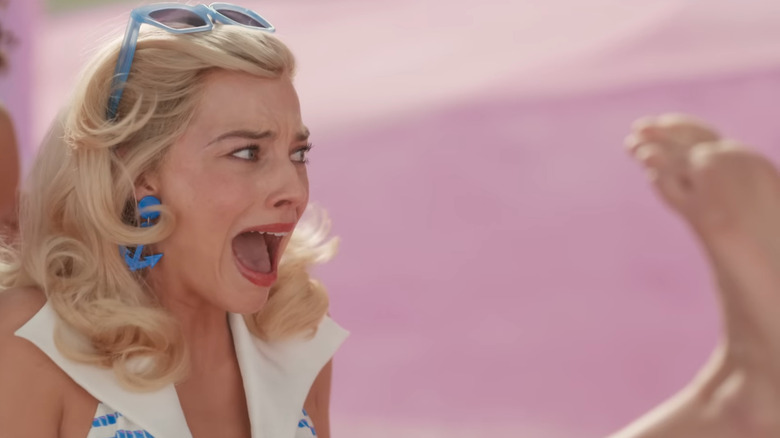 Margot Robbie as Barbie screaming