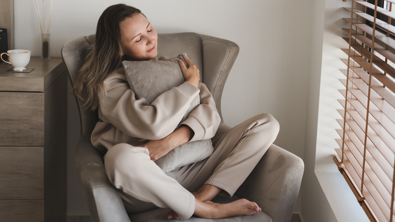 Woman sat on chair