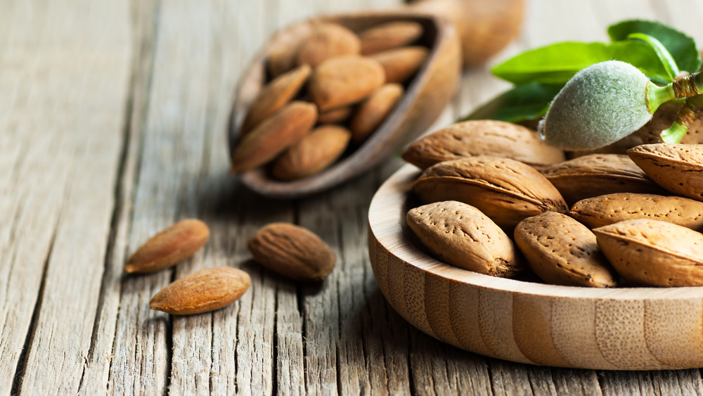 Bowl of almonds in shell