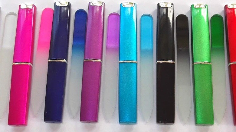 rainbow glass nail files next to cases