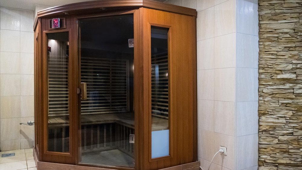 Wooden infrared sauna indoors