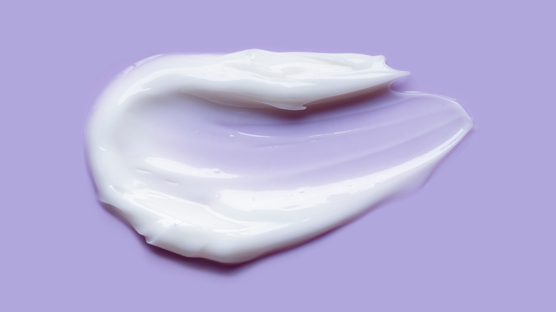 Shampoo on purple background