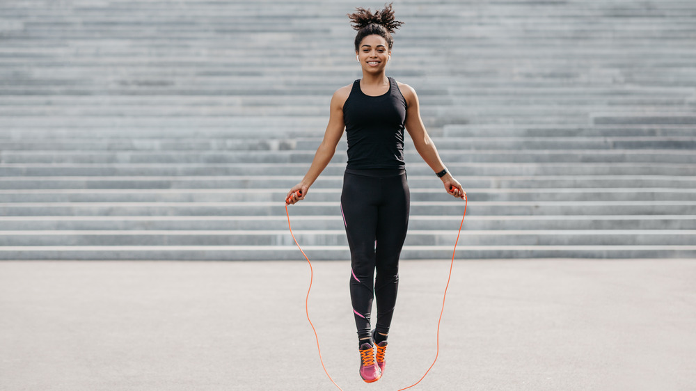 Woman jumping rope