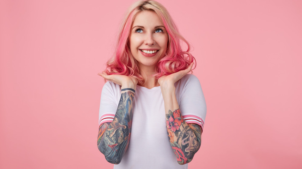 Women with tattoos on her arms