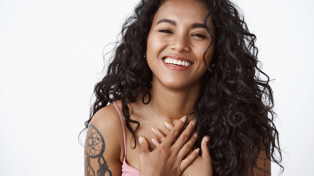 woman with a tattoo on her arm