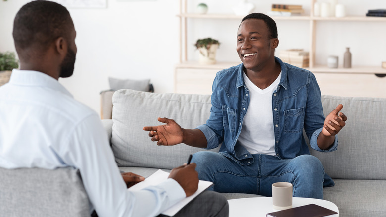 Man talking with therapist