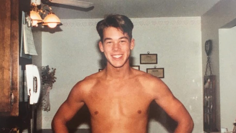 Young David Bromstad smiling