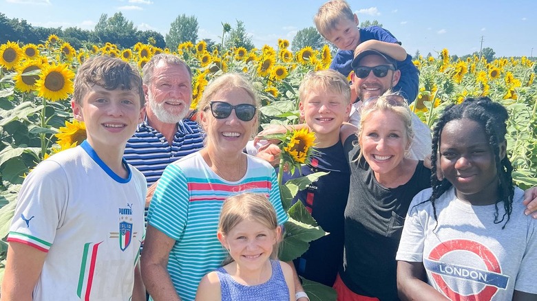 The Marrs family in a sunflower field