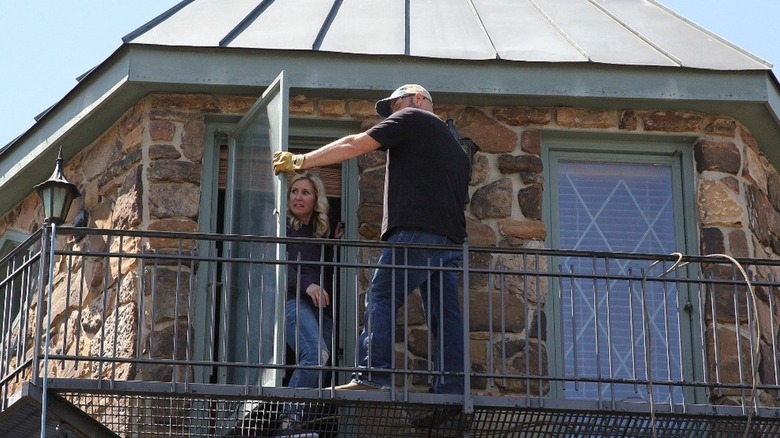 Jenny Marrs looking scared on balcony