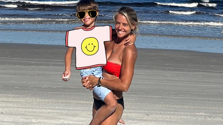 Curtis with Harper on the beach 