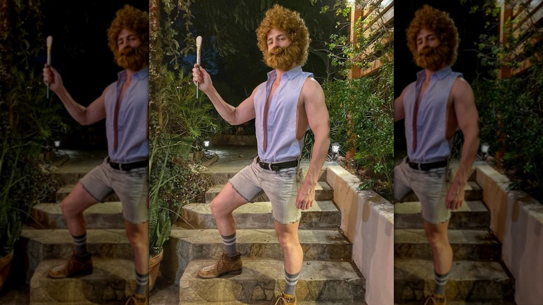 Orlando Soria dressed as a sexy version of painter Bob Ross for Halloween.