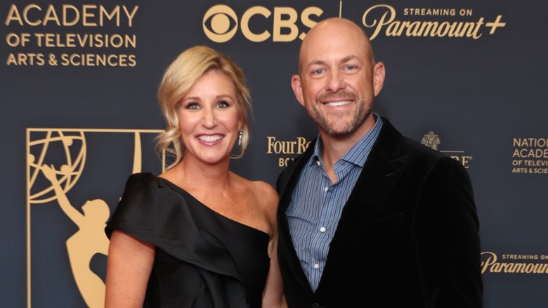 Jenny Marrs and Dave Marrs smiling on the red carpet