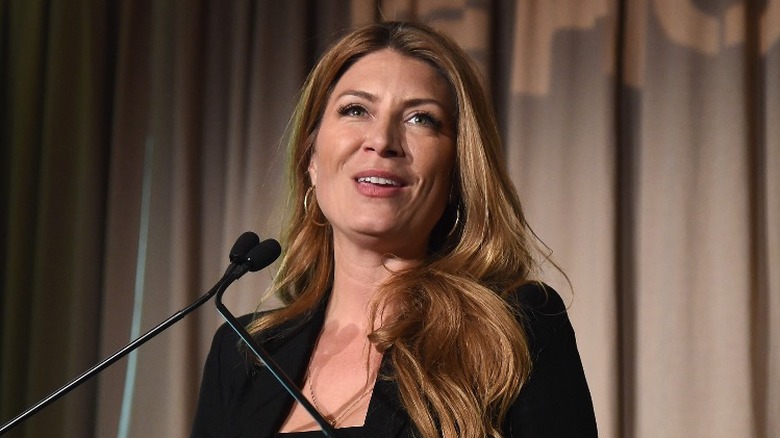 Genevieve Gorder speaking into mics