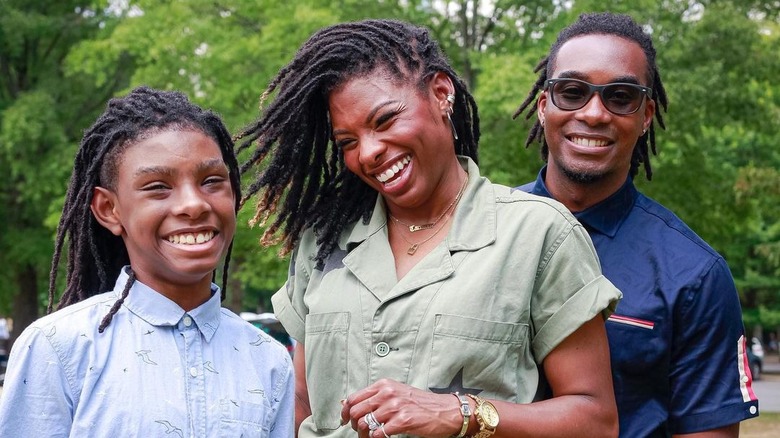 Carmeon Hamilton with family smiling