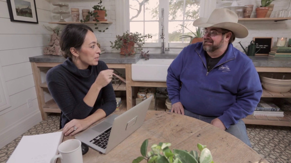 Jimmy Don  and Joanna Gaines sitting at a table