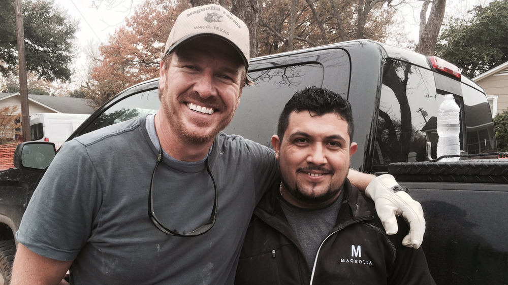 Chip Gaines with an arm around Shorty