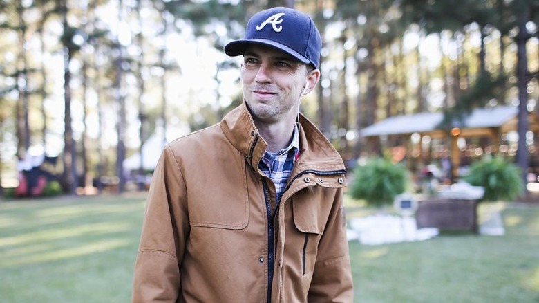 HGTV's Brandon Davis in a blue cap