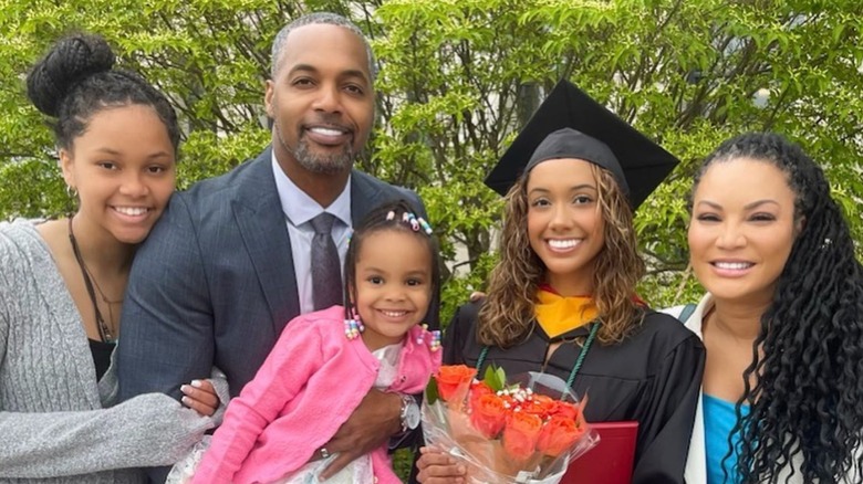 Egypt Sherrod and Mike Jackson attend daughter's graduation