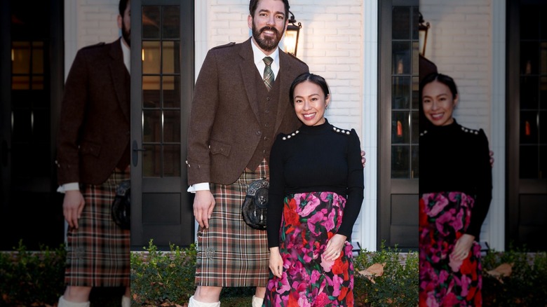 Drew Scott in kilt and Linda Phan smile side by side