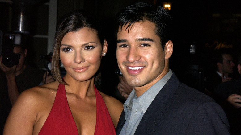 Ali Landry and Mario Lopez attending an event