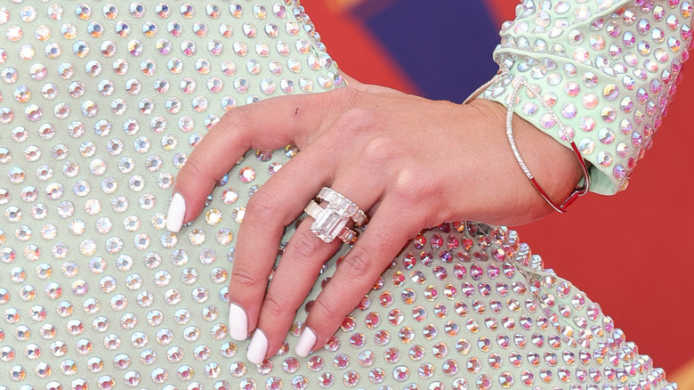 close-up of Heather Rae Young's engagement ring and wedding band