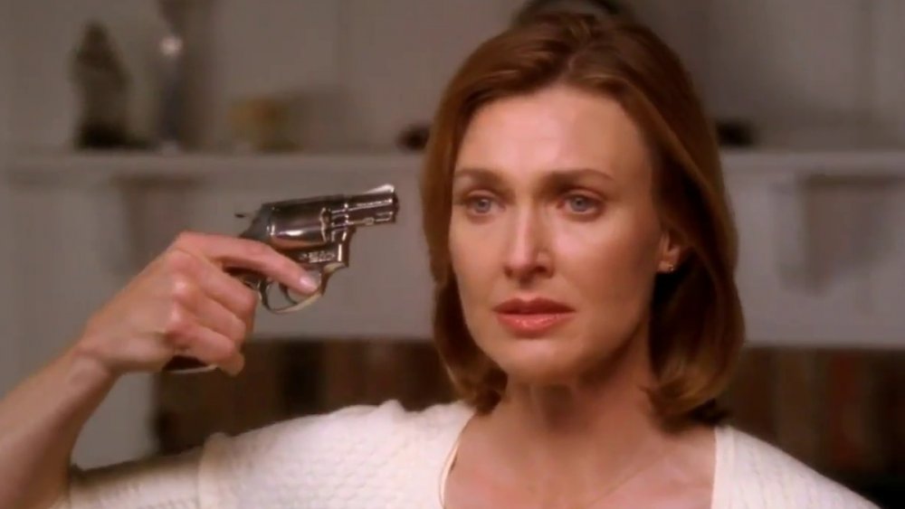 Brenda Strong with a gun in Desperate Housewives