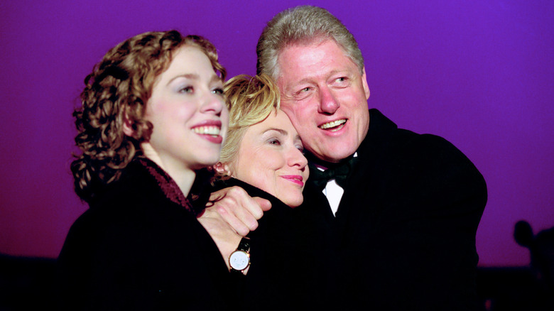 The Clinton family embracing