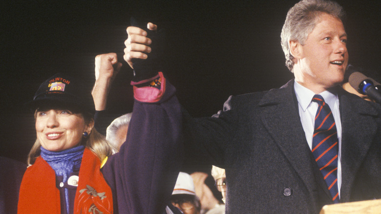 Hillary Clinton and Bill Clinton smile