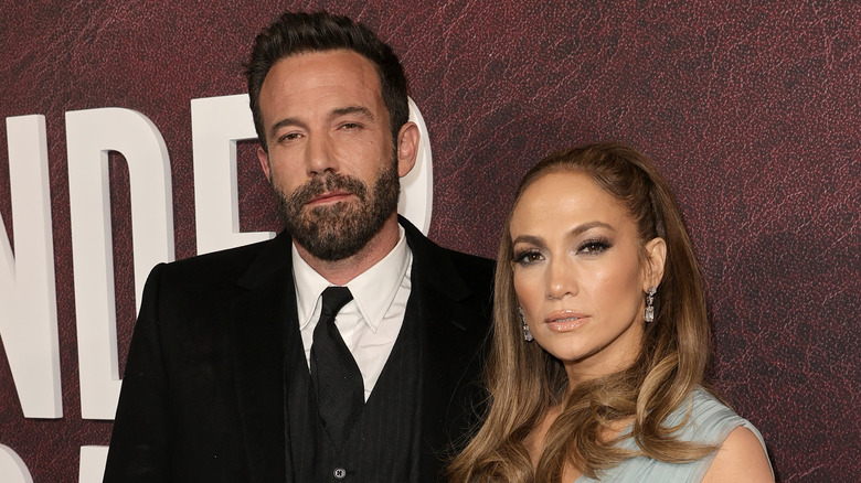 Jennifer Lopez and Ben Affleck pose for a photo. 