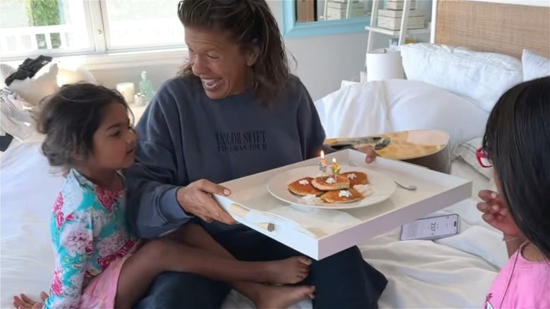 Hoda Kotb sits on bed with daughter Hope