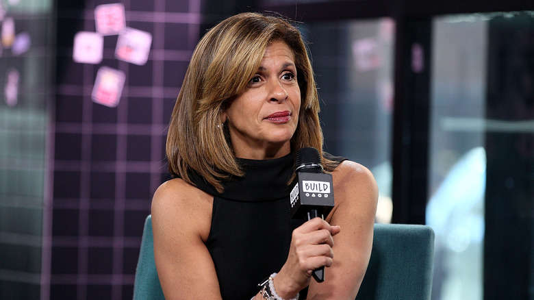 Hoda Kotb holding microphone