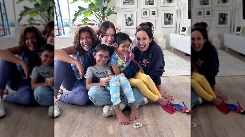 Hoda Kotb, her children, and her friends smiling together