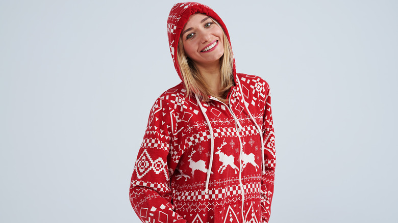 girl in hooded holiday pajamas