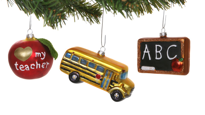 Apple, bus, and blackboard ornaments