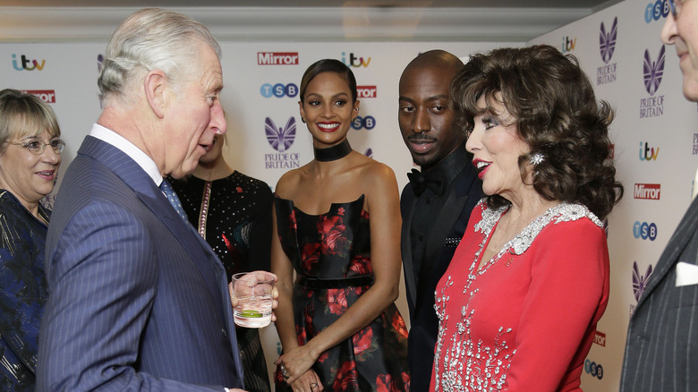 King Charles and Joan Collins