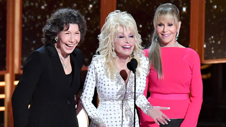 Lily Tomlin, Dolly Parton, and Jane Fonda on stage