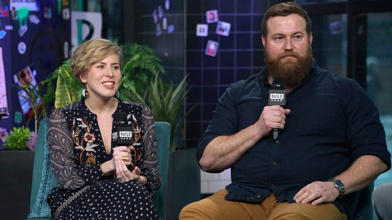 Erin and Ben Napier sit with microphones