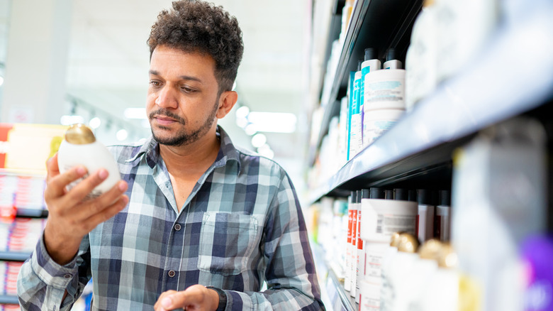 Man shopping for hair care products