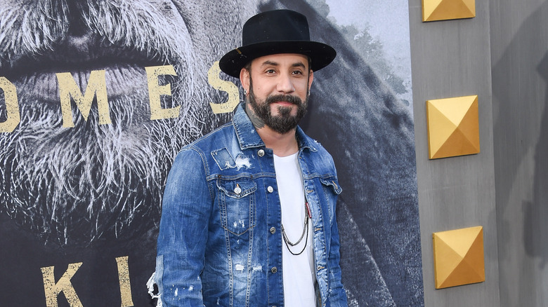 AJ McLean posing at event