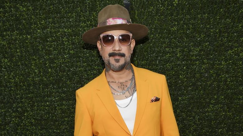 AJ McLean posing at event