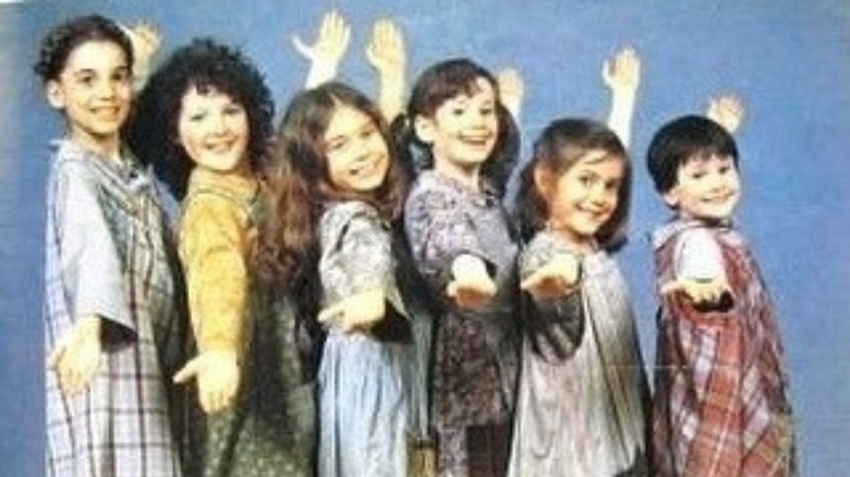 Alyssa Milano (second from right) with other castmembers of Annie